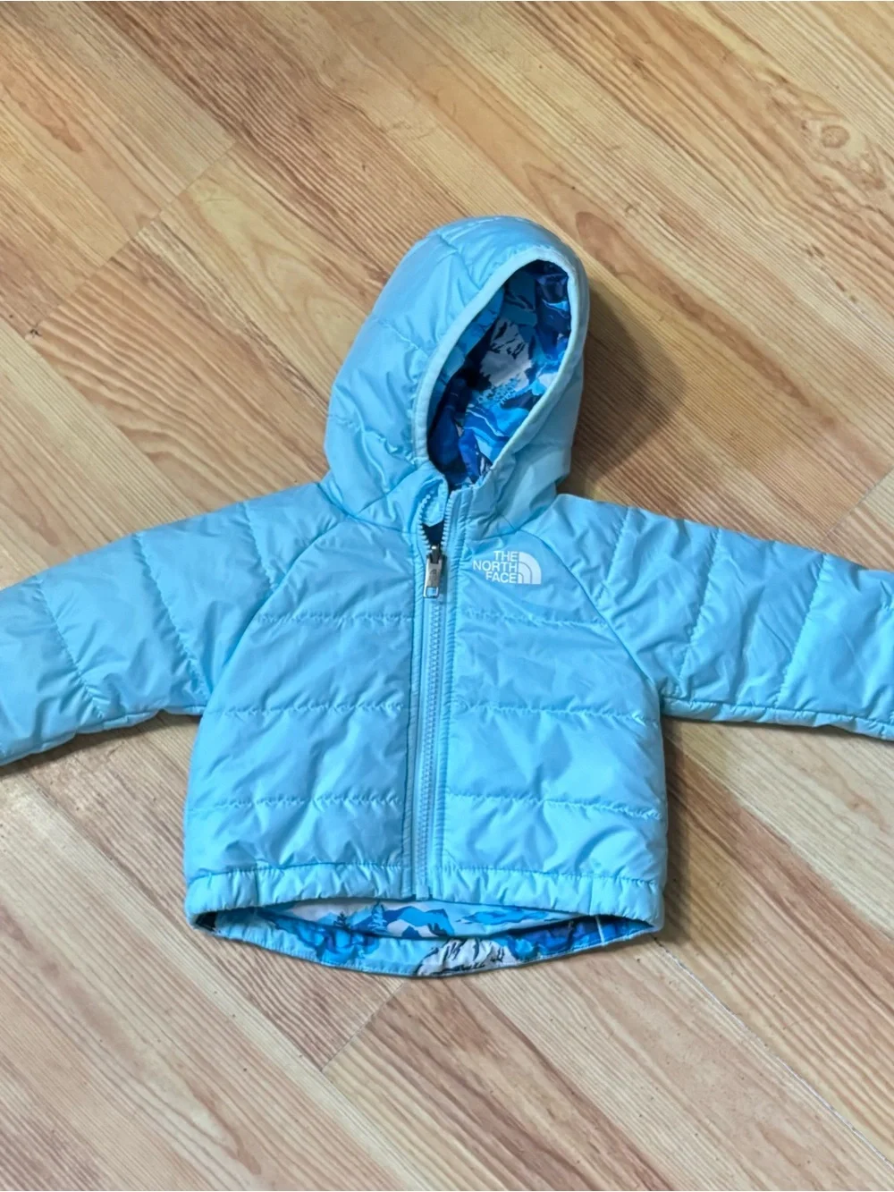 The North Face. Baby coat.  Reversible blue